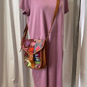 Beautiful Handmade Embroidered Leather crossbody purse. 2 inside pockets.